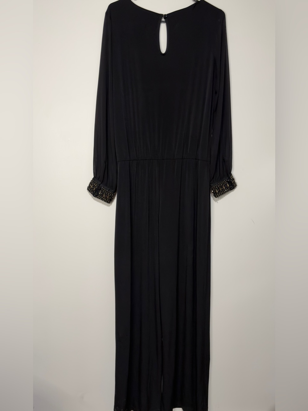 AGB Elegant Black Long-Sleeve Jumpsuit with Beaded Cuffs